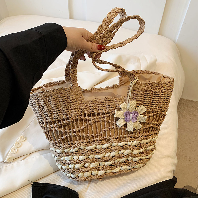 2025 Women's Hollow Woven Straw Beach Bag - Handheld Summer Seaside Vacation Tote for Commuting and Vegetables 2025 Women's Hollow Woven Straw Beach Bag - Handheld Summer Seaside Vacation Tote for Commuting and Vegetables
