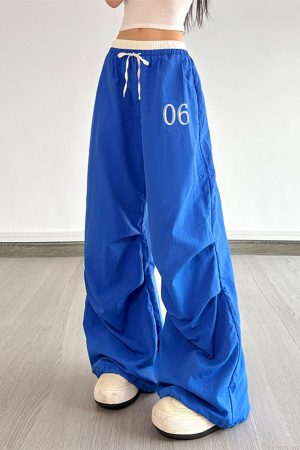 Color-Block Letter Short-Sleeve T-Shirt Top & Waist-Seamed Pleated Loose Dance Long Pants Set - Trendy Two-Piece Outfit