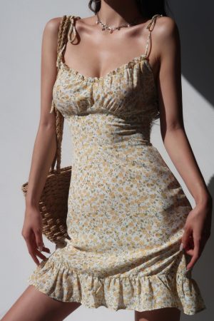 French-Style Yellow Floral V-Neck Tie Strap Dress with Waist-Cinching Short Skirt - Playful Vacation Essential
