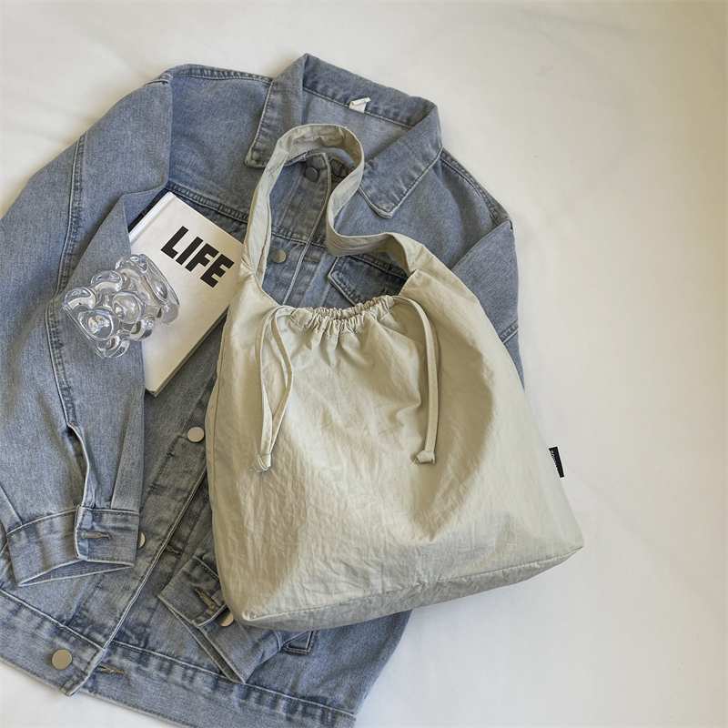 Large Capacity Women's Drawstring Cloth Shoulder Bag - 2025 Summer Fashion Tote for Commuting and Everyday Use Large Capacity Women's Drawstring Cloth Shoulder Bag - 2025 Summer Fashion Tote for Commuting and Everyday Use