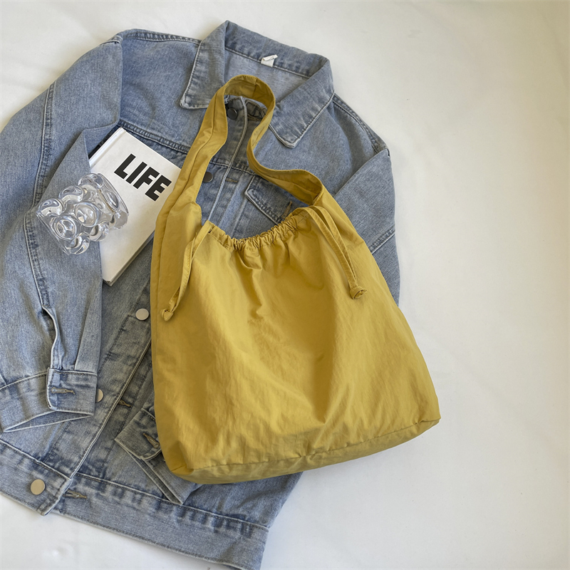 Large Capacity Women's Drawstring Cloth Shoulder Bag - 2025 Summer Fashion Tote for Commuting and Everyday Use Large Capacity Women's Drawstring Cloth Shoulder Bag - 2025 Summer Fashion Tote for Commuting and Everyday Use