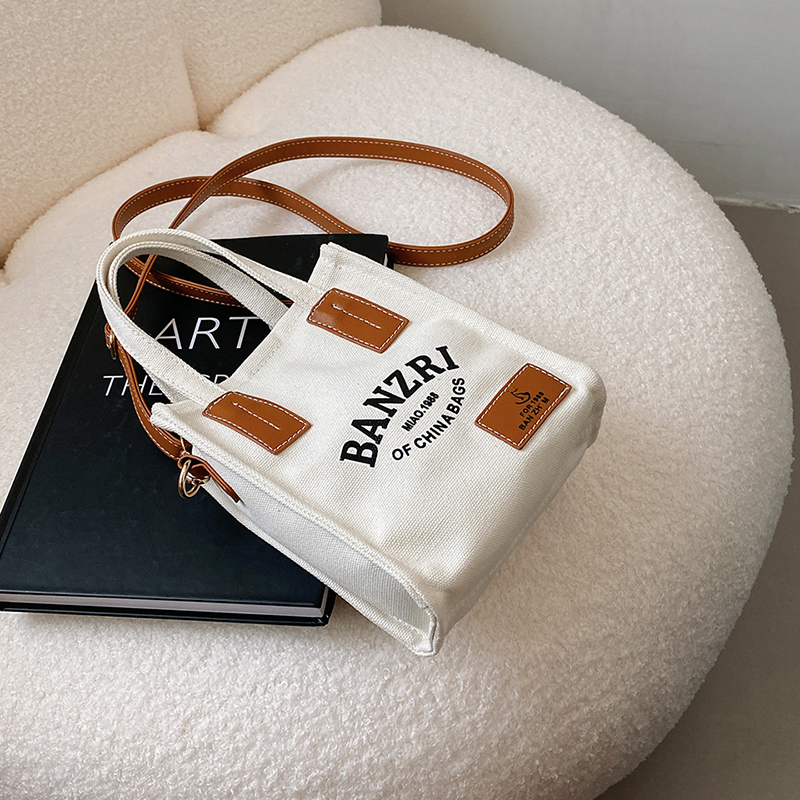 Small Canvas Handbag for Women - Versatile Casual Crossbody Bag for Spring/Summer 2025, Niche Instagram Fashion Small Canvas Handbag for Women - Versatile Casual Crossbody Bag for Spring/Summer 2025, Niche Instagram Fashion