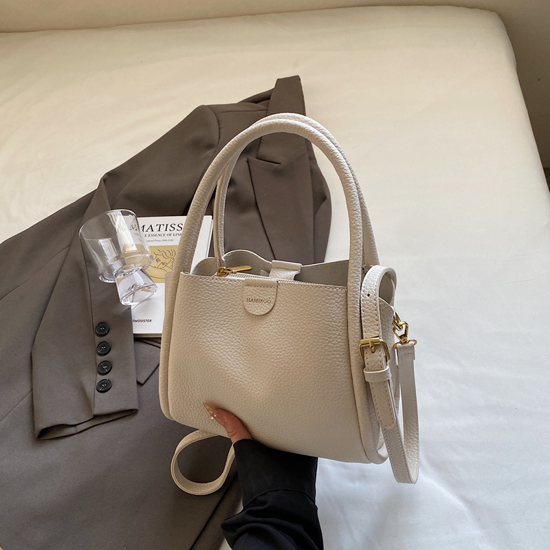 Spring 2025 High-End Versatile Tote Bucket Bag - Simple Casual Shoulder & Crossbody Bag for Work and Everyday Use Spring 2025 High-End Versatile Tote Bucket Bag - Simple Casual Shoulder & Crossbody Bag for Work and Everyday Use