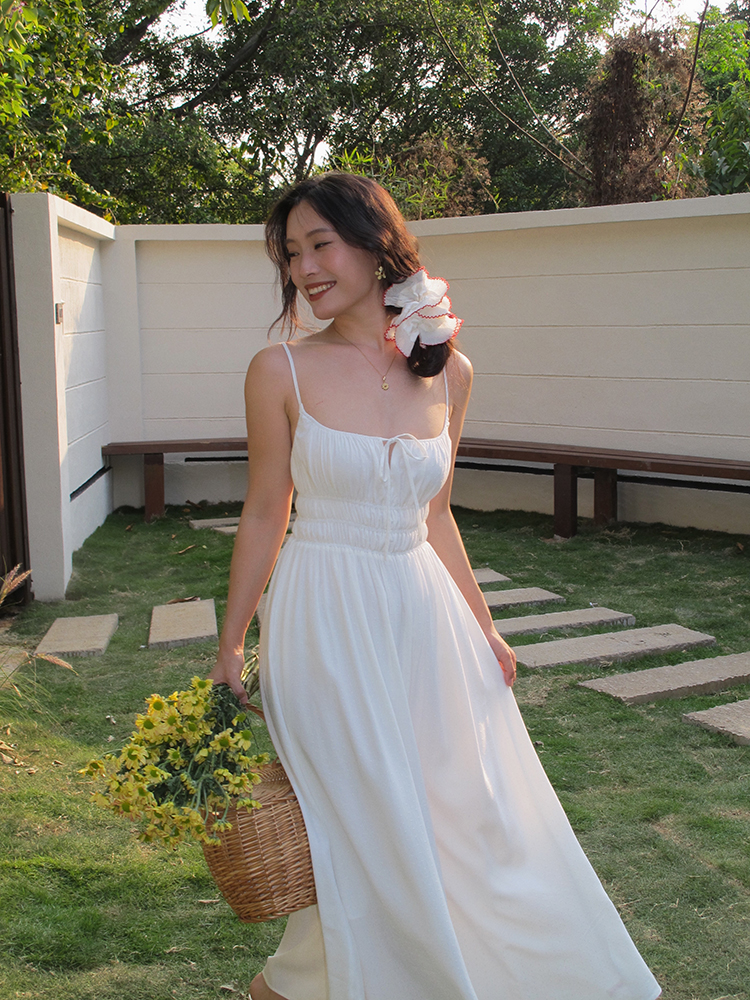 White Spaghetti Strap A-Line Dress with Long Skirt – Sexy Vacation Style, Trendy French Design, Perfect for Summer Events White Spaghetti Strap A-Line Dress with Long Skirt – Sexy Vacation Style, Trendy French Design, Perfect for Summer Events