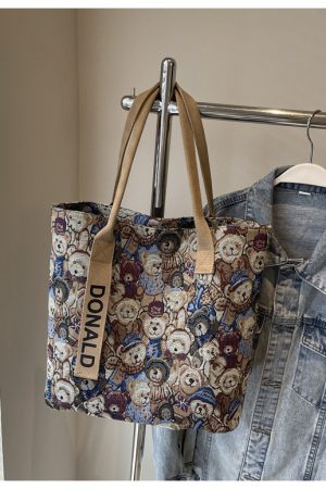 Womenâ€™s Niche Cartoon Canvas Tote Bag â€“ Large Capacity Spring 2025 Commuter Shoulder Bag for Students