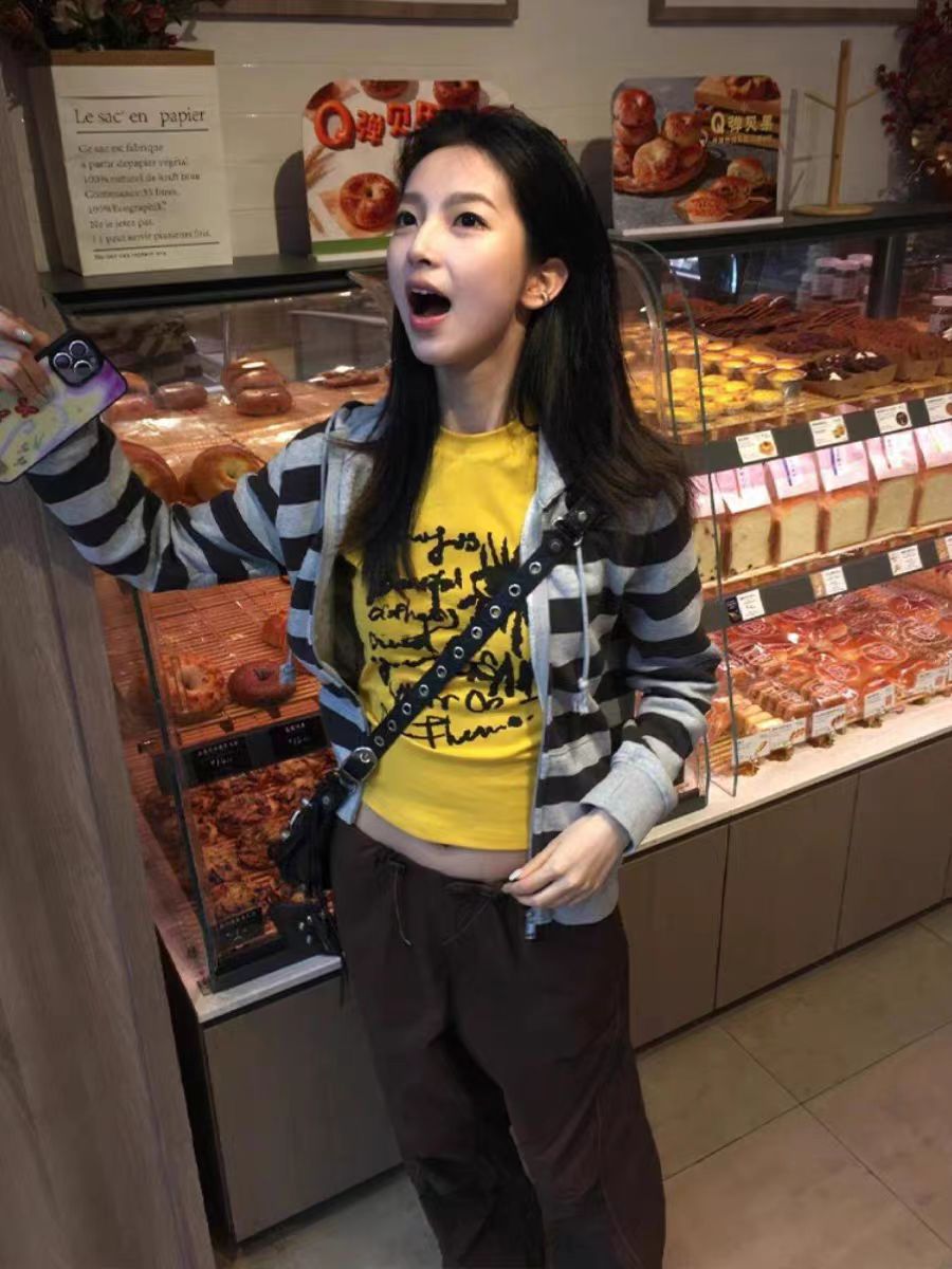 Yellow Off-Shoulder T-Shirt for Women - Graffiti Print, Short Sleeves, Slim Fit, Summer Sweet and Spicy Style Yellow Off-Shoulder T-Shirt for Women - Graffiti Print, Short Sleeves, Slim Fit, Summer Sweet and Spicy Style