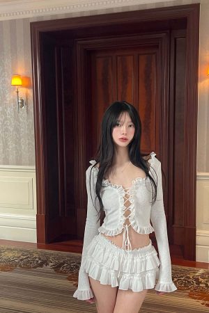 DreamyNerd Rosette Lace-Up Cardigan & Ruffle Mini Skirt Set – Ivory Whimsy