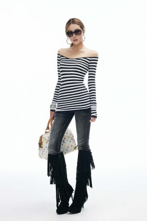 IAMXIAA Low Rise Washed Flare Jeans with Distressed Fade