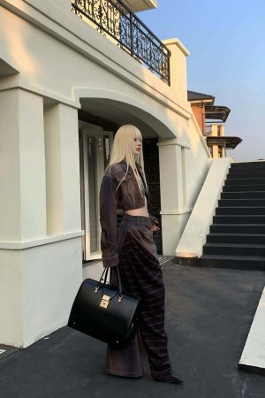 Rase le sol Cropped Denim Jacket and Paneled Skirt Set