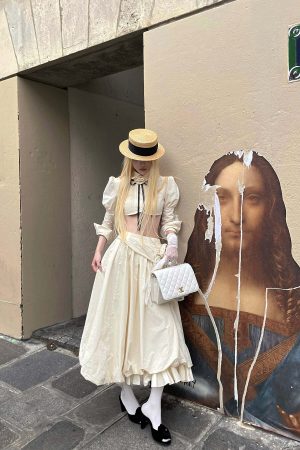 Rase le sol Cropped Puff-Sleeve Shirt with Pleated Front and Rosette Tie