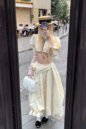 Rase le sol Cropped Puff-Sleeve Shirt with Pleated Front and Rosette Tie