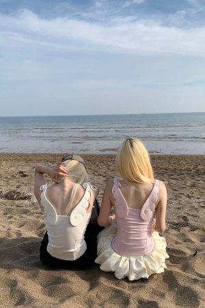 Rase le sol Cross-Stitched Winged Strap Bow Tank Top