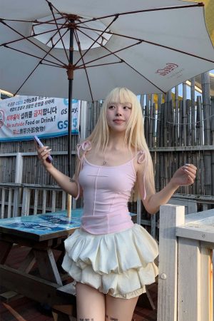 Rase le sol Cross-Stitched Winged Strap Bow Tank Top