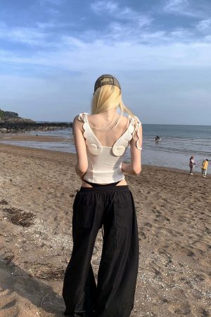 Rase le sol Cross-Stitched Winged Strap Bow Tank Top