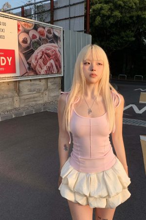 Rase le sol Cross-Stitched Winged Strap Bow Tank Top