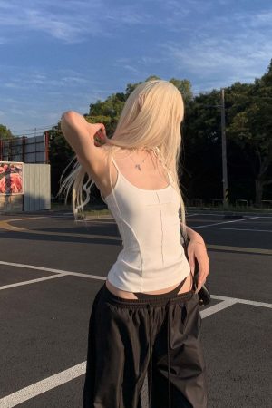 Rase le sol Cross-Stitched Winged Strap Bow Tank Top