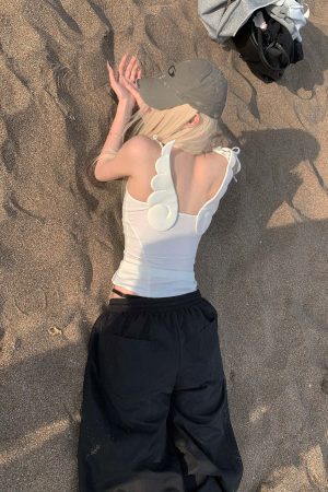 Rase le sol Cross-Stitched Winged Strap Bow Tank Top