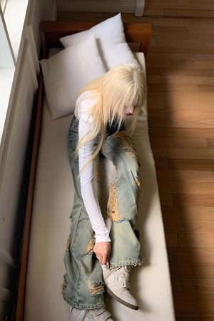 Rase le sol Distressed Flared Denim Pants