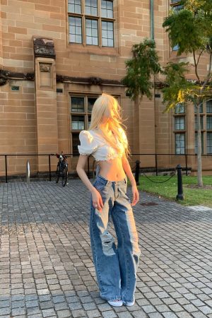 Rase le sol Distressed Wide-Leg Washed Denim Jeans