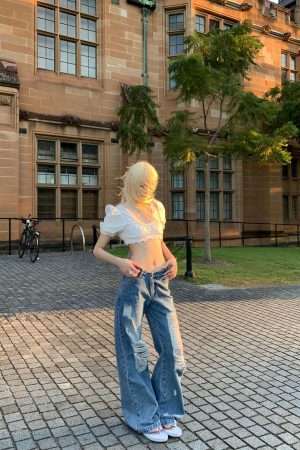 Rase le sol Distressed Wide-Leg Washed Denim Jeans