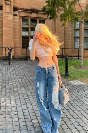 Rase le sol Distressed Wide-Leg Washed Denim Jeans