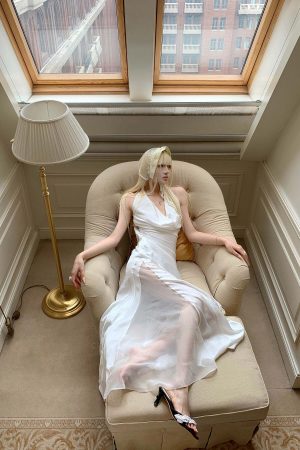 Rase le sol Draped Halter Backless Gown with Oversized Bow