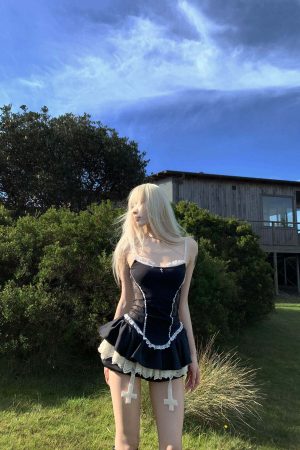 Rase le sol Lace-Trimmed Vest and Skirt Set with Cross Detail