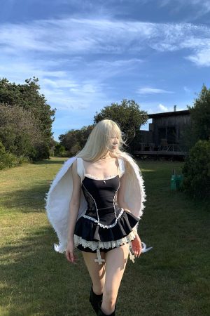 Rase le sol Lace-Trimmed Vest and Skirt Set with Cross Detail