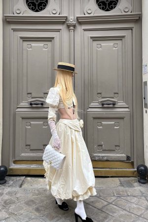 Rase le sol Mid-Length Skirt with 3D Rose Detail and Asymmetric Gathered Hem