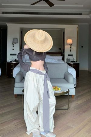 Rase le sol Off-Shoulder Paneled Long Sleeve Top