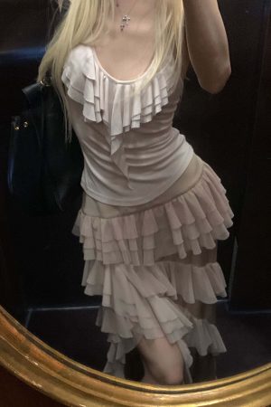 Rase le sol Ruffled Halter Sleeveless Knit Top in Soft Cream