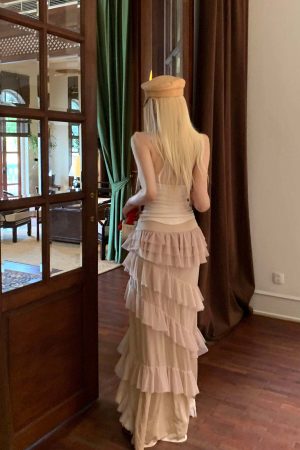 Rase le sol Ruffled Halter Sleeveless Knit Top in Soft Cream