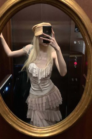 Rase le sol Ruffled Halter Sleeveless Knit Top in Soft Cream