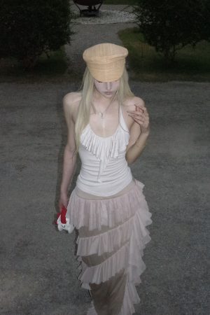 Rase le sol Ruffled Halter Sleeveless Knit Top in Soft Cream