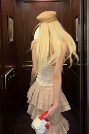 Rase le sol Ruffled Halter Sleeveless Knit Top in Soft Cream