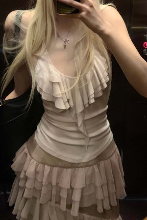 Rase le sol Ruffled Halter Sleeveless Knit Top in Soft Cream