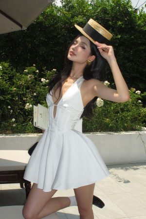 ROVENTE Deep V Halter Mini Dress with Flared Skirt