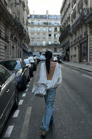 ROVENTE Draped Open Back Long Sleeve Top with Adjustable Strap