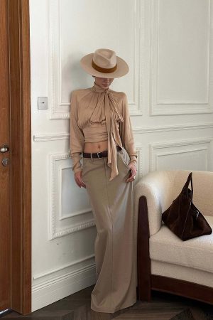 ROVENTE High Neck Tie Backless Blouse