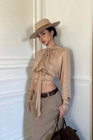 ROVENTE High Neck Tie Backless Blouse