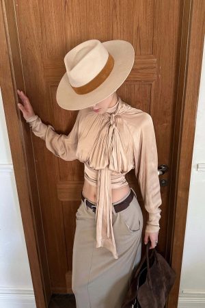 ROVENTE High Neck Tie Backless Blouse