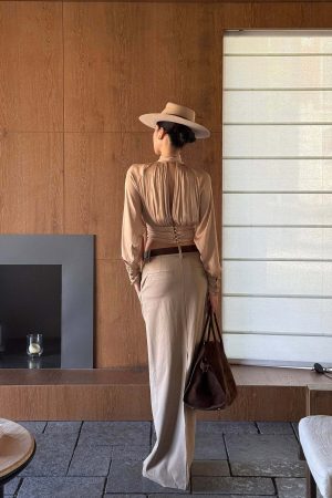 ROVENTE High Neck Tie Backless Blouse