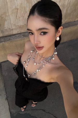 ROVENTE Lace Trim Corset Top and Flared Pants Set