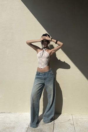 ROVENTE Low Rise Wide-Leg Distressed Jeans