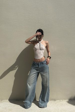 ROVENTE Low Rise Wide-Leg Distressed Jeans