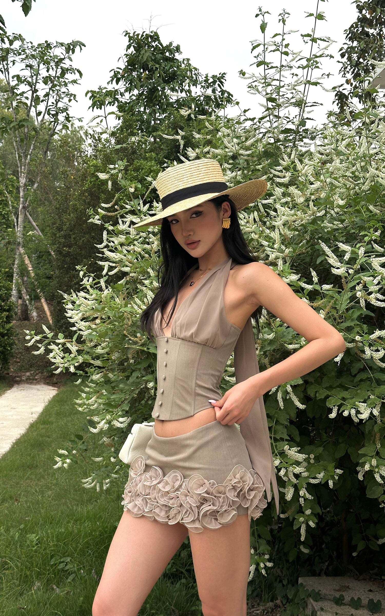 ROVENTE Rosette Trim Mini Skirt Set with Halter Corset Top ROVENTE Rosette Trim Mini Skirt Set with Halter Corset Top