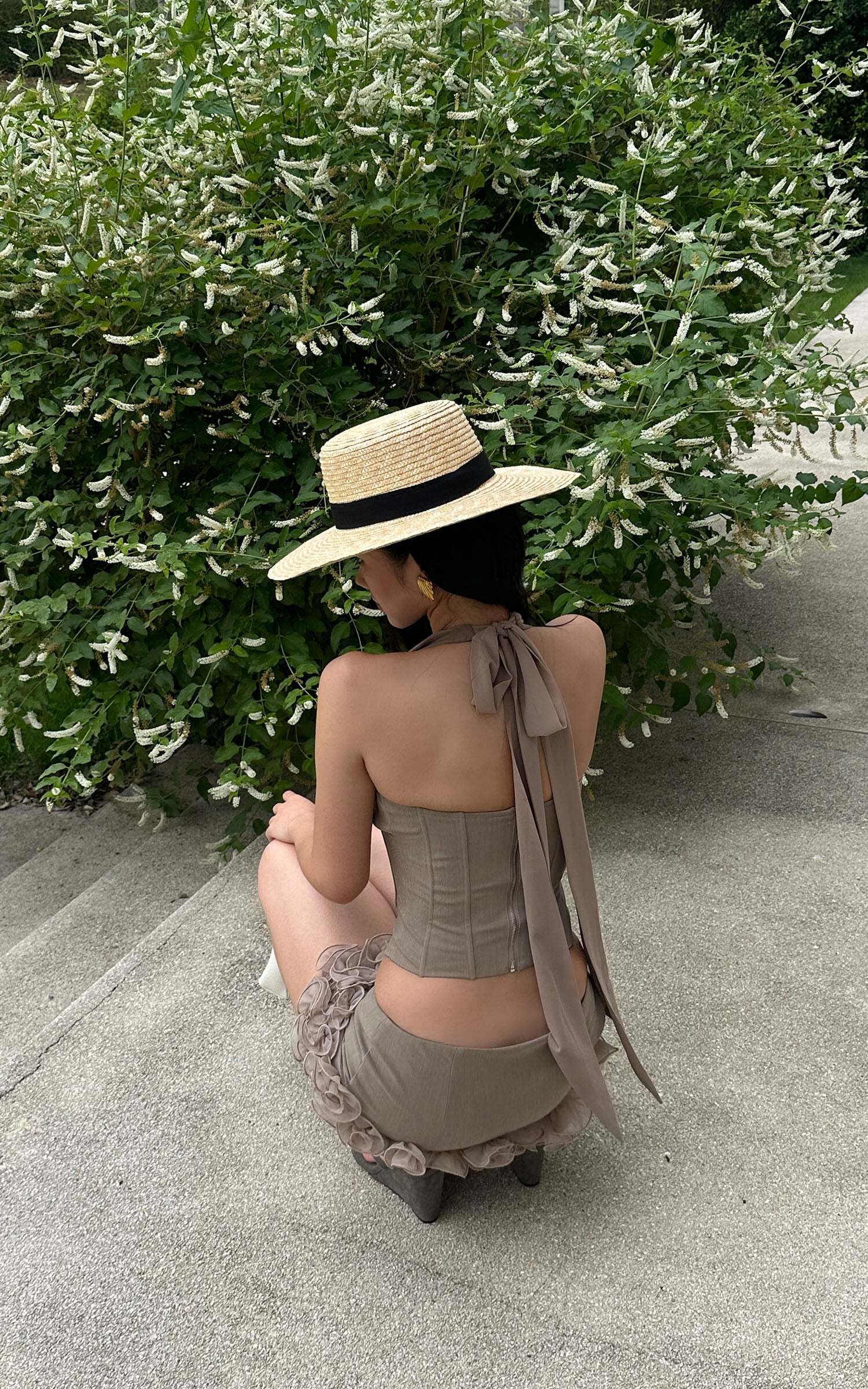 ROVENTE Rosette Trim Mini Skirt Set with Halter Corset Top ROVENTE Rosette Trim Mini Skirt Set with Halter Corset Top