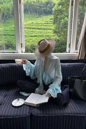 ROVENTE Sheer Ruffle Tie Blouse