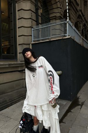 WARDEN EDGE Asymmetric Layered Skirt with Ruffle Detail