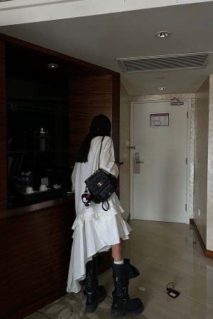 WARDEN EDGE Asymmetric Layered Skirt with Ruffle Detail